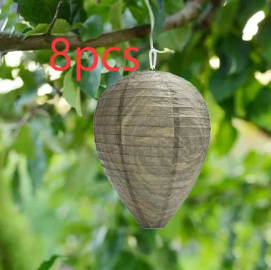 A collapsible paper and wire beehive lantern measuring 22 by 28 centimetres in a photo colour finish.