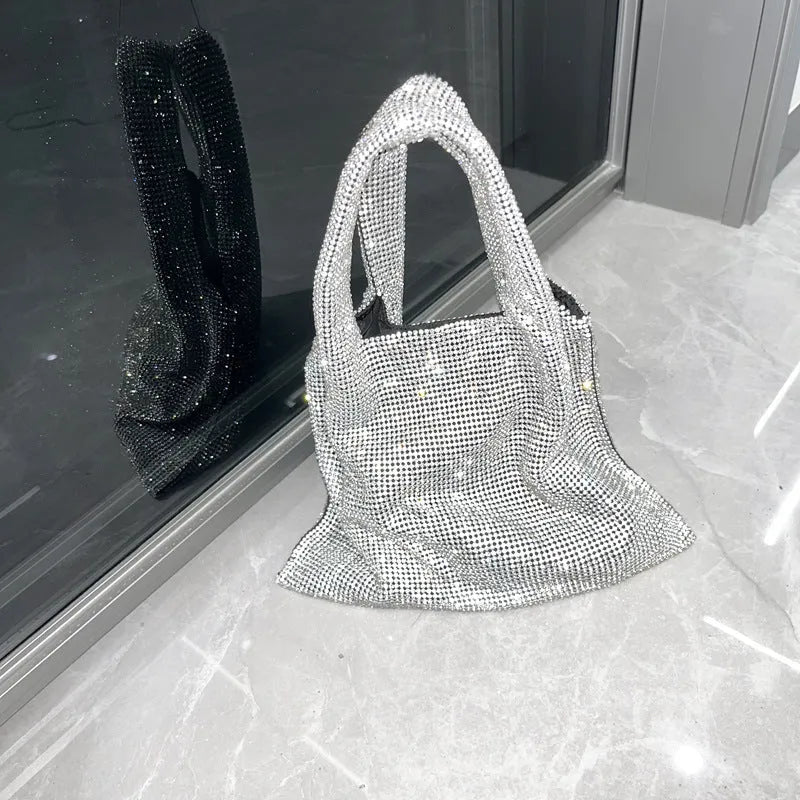 Silver evening handbag with shiny rhinestone decoration and cotton thread construction