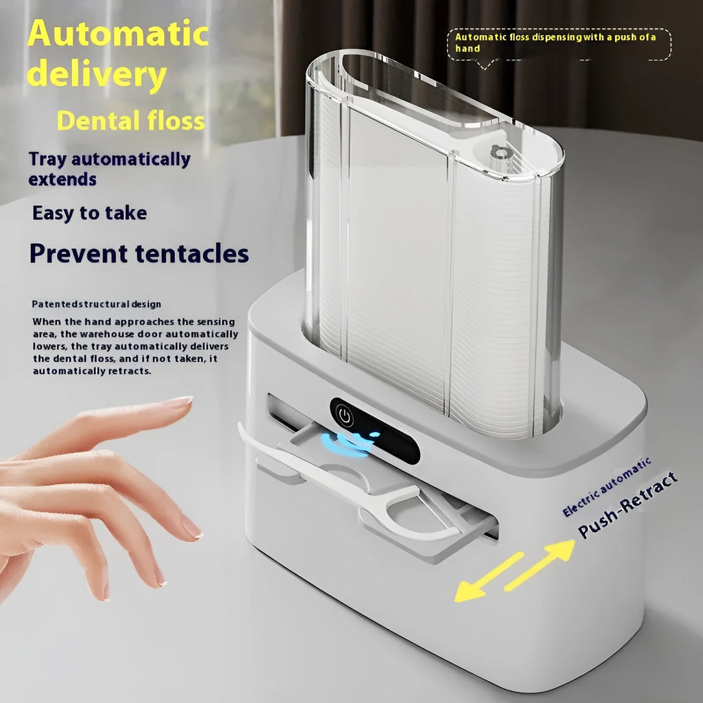 Dark gray automatic dental floss box with USB charging port and pop-up floss dispenser.