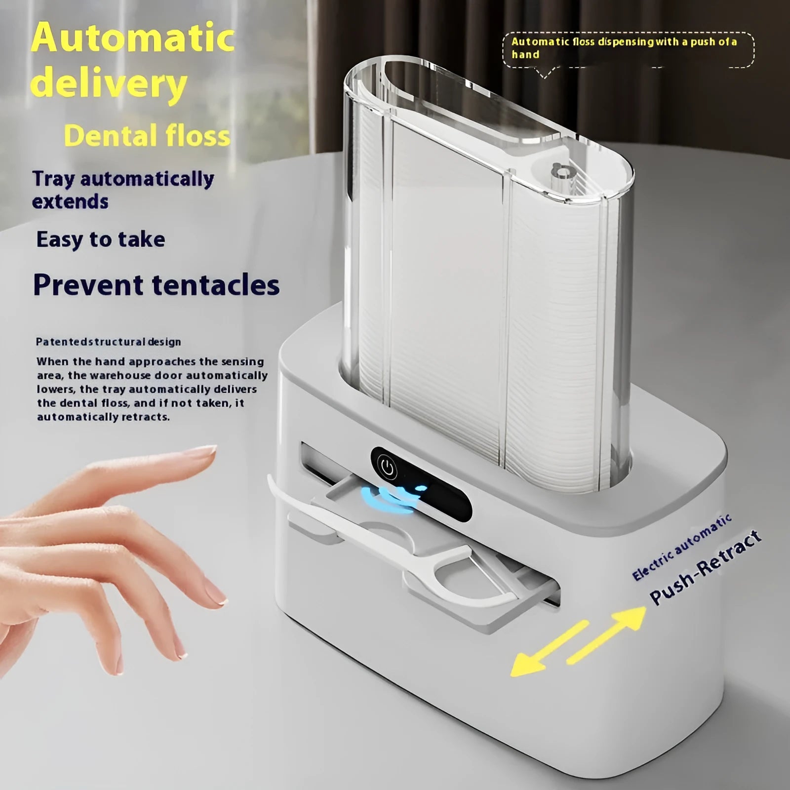 Dark gray automatic dental floss box with USB charging port and pop-up floss dispenser.