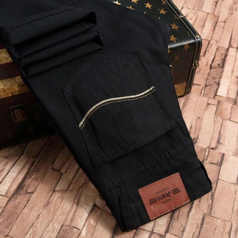 Men's loose straight casual work stretch jeans in blue elastic option with mid-waist and straight leg