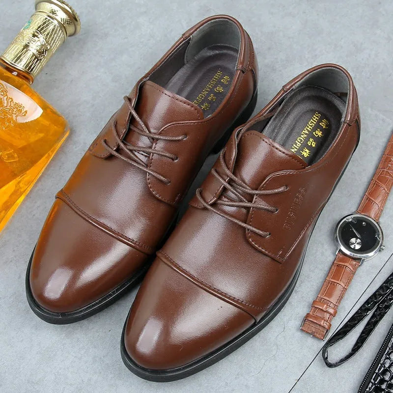 Men's black formal leather lace-up shoes with stitching detail and rubber sole