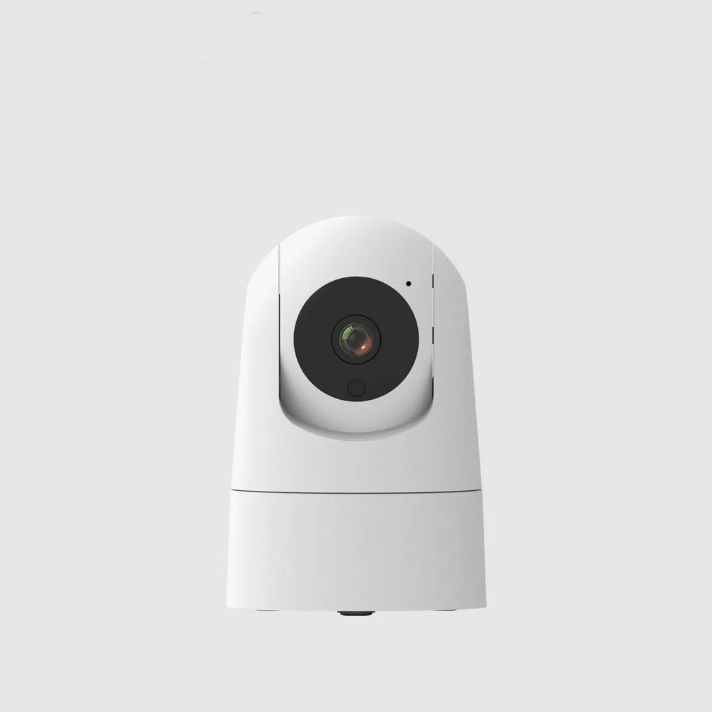White indoor security camera with lens on a circular motorised base, showing compact size for shelf placement.