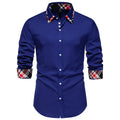 Man wearing a blue plaid contrast long-sleeve shirt with a triangle collar.