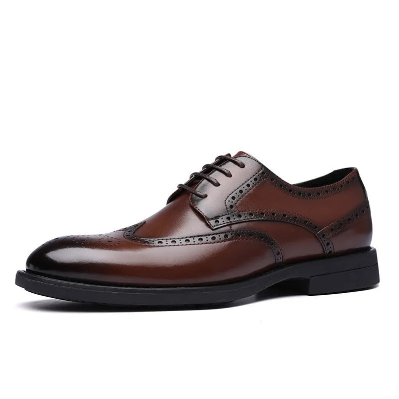 Men's classic brown brogue leather business shoes on a white background.