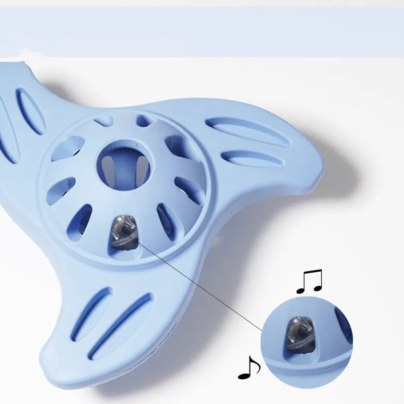 Blue boomerang-shaped rubber dog chew toy with molar texture for medium and large breed dogs.