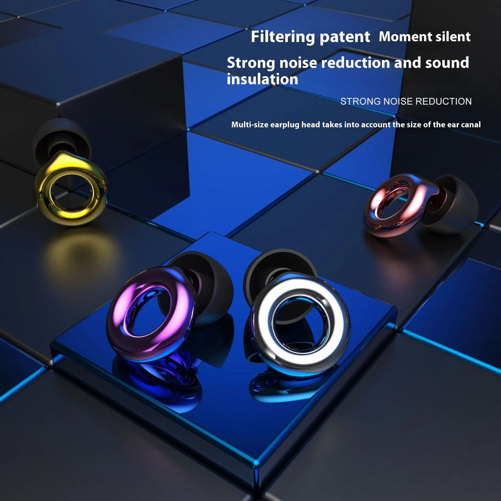 Set of silicone noise reduction earplugs in multiple colours with a storage box and spare ear caps.