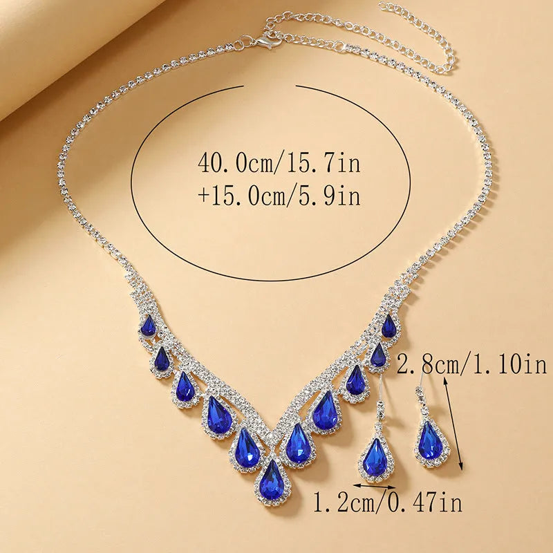 Sapphire blue alloy clavicle chain necklace and earrings set in Royal Blue White K finish on display