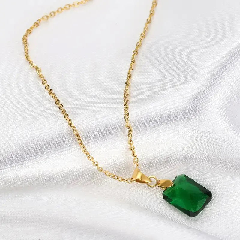 Copper geometric rectangular pendant necklace in XL1006 green on an O-ring chain.
