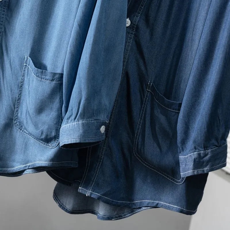 Men's dark blue casual denim coat with three-quarter sleeves and a V-neck collar.