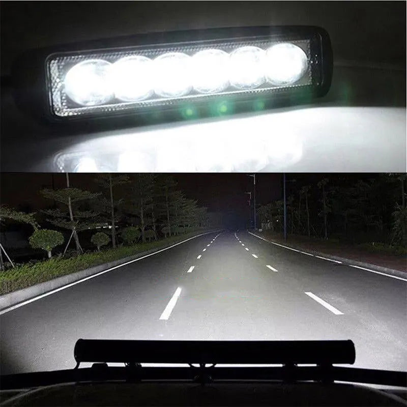 Black die-cast aluminium 18W auxiliary spotlight for car or truck mounting.