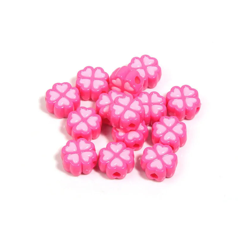 Assortment of 15mm frosted acrylic four-leaf clover beads in rose red, pink, yellow, green, blue, and purple.