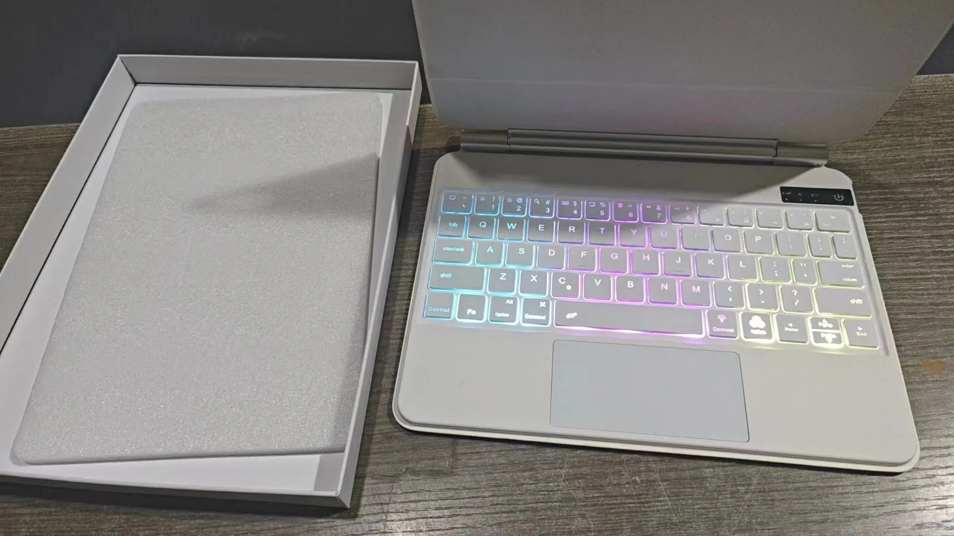 Bluetooth wireless keyboard with magnetic protective cover for iPad Pro and iPad Air tablets in various colours.