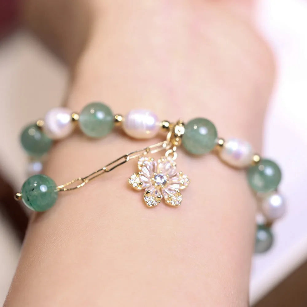 Green strawberry freshwater pearl bracelet with Chinese knot and peace buckle design