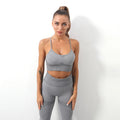 Women's seamless knitted sling sports bra and yoga trousers set in solid colour for fitness