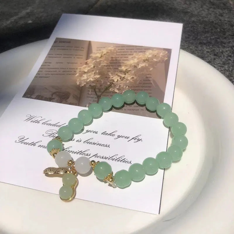 Chinese style bamboo leaf glass bracelet for women with manual craftsmanship.