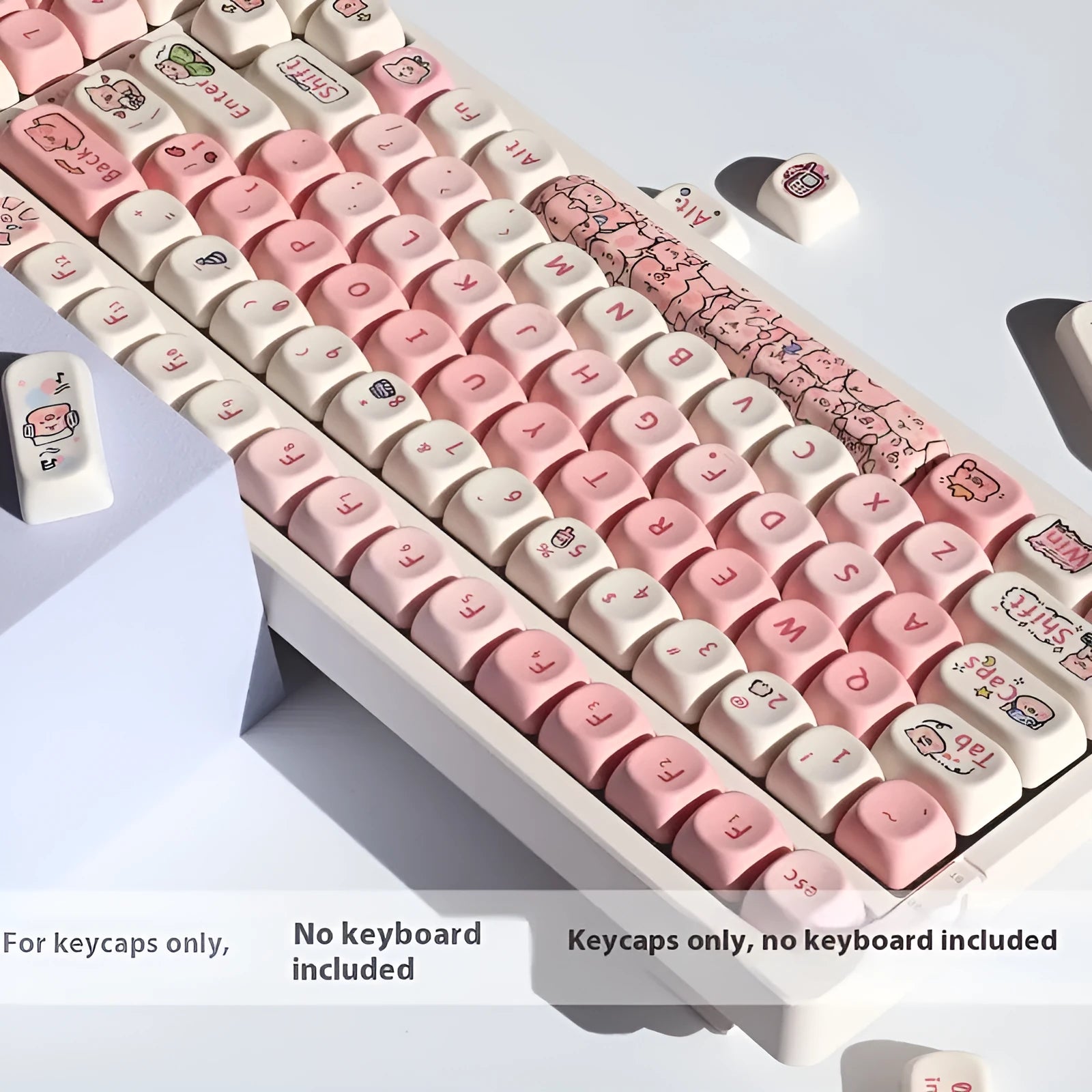 Pink fragrant pig design PBT plastic keycap for mechanical keyboards shown with keycap puller.