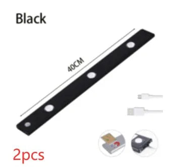 Silver ultra-thin wireless LED strip light with motion sensor attached to a kitchen cabinet door.