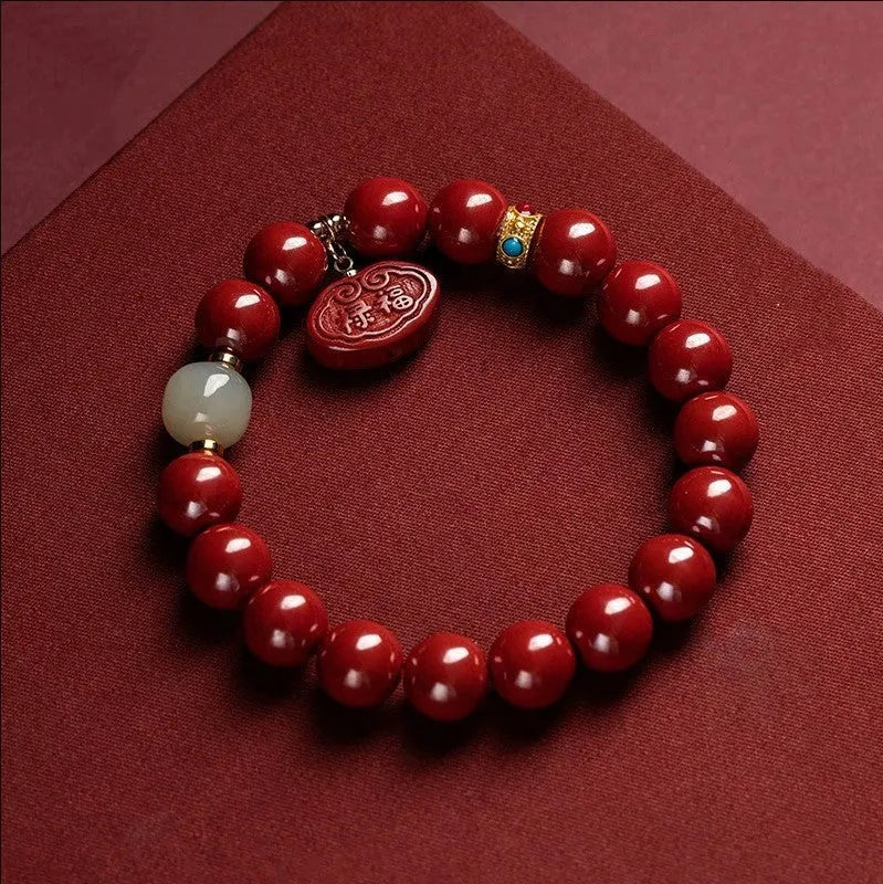 Natural cinnabar Emperor Sandstone bracelet with Ping An Fu Lu design in 8mm or 10mm bead size