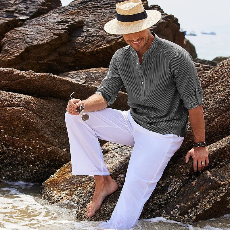 Men's casual long sleeve stand collar solid colour pullover shirt in loose fit available in multiple colours