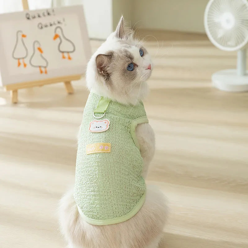 Cat clothes with bear patch in hollowed-out knitted fabric, available in blue green yellow colours