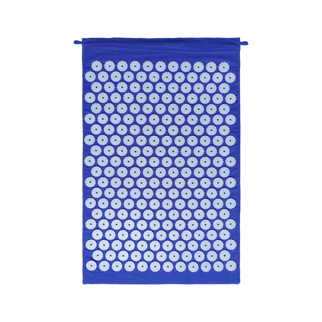 Acupuncture massage mat yoga mat set with black and blue cushion and headrest on floor