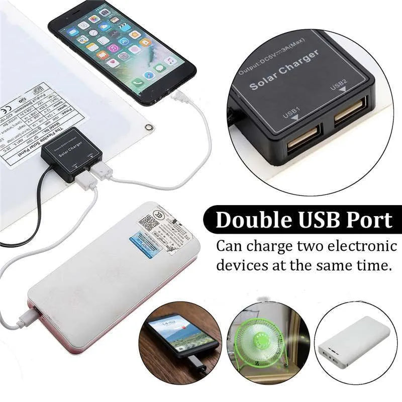 Black portable solar panel with dual USB ports for outdoor charging of mobile phones and tablets.