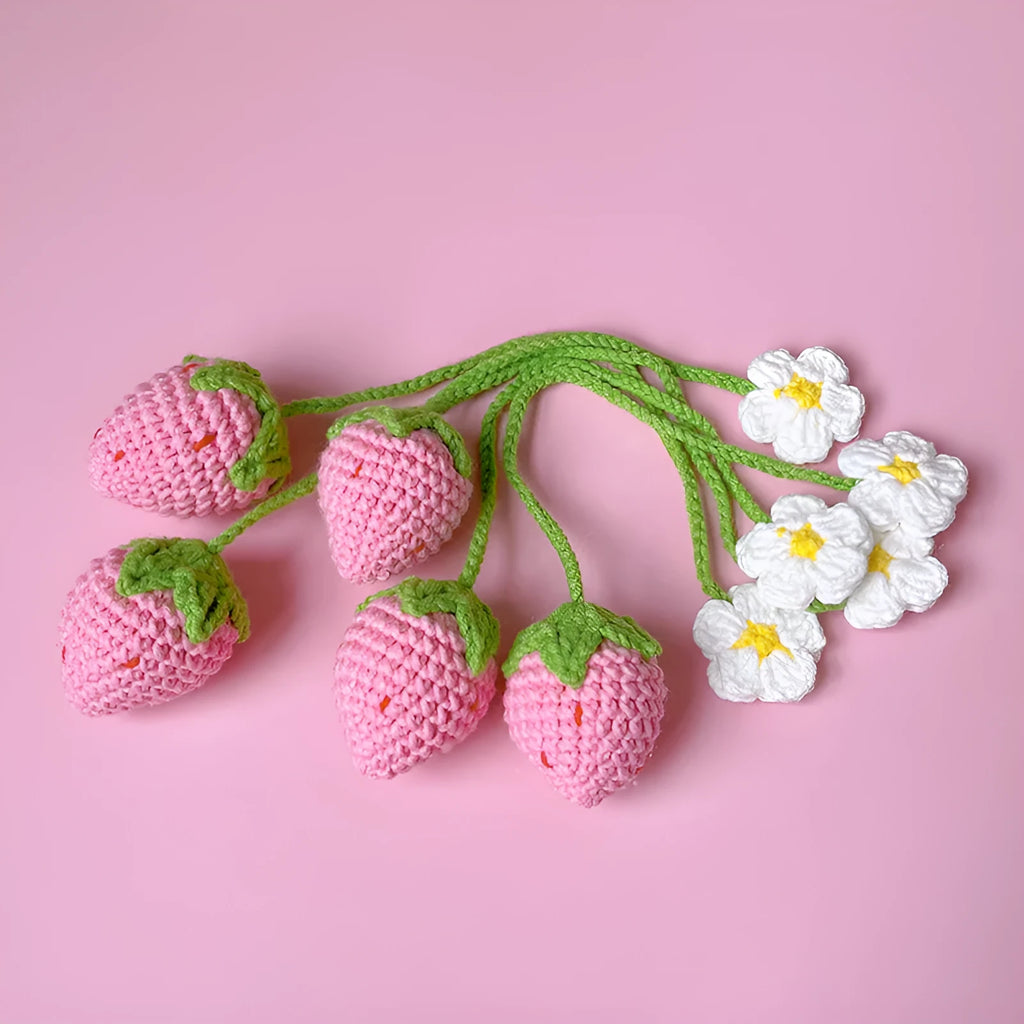 Handmade wool crochet strawberry pendant with woven texture in pink or red colours