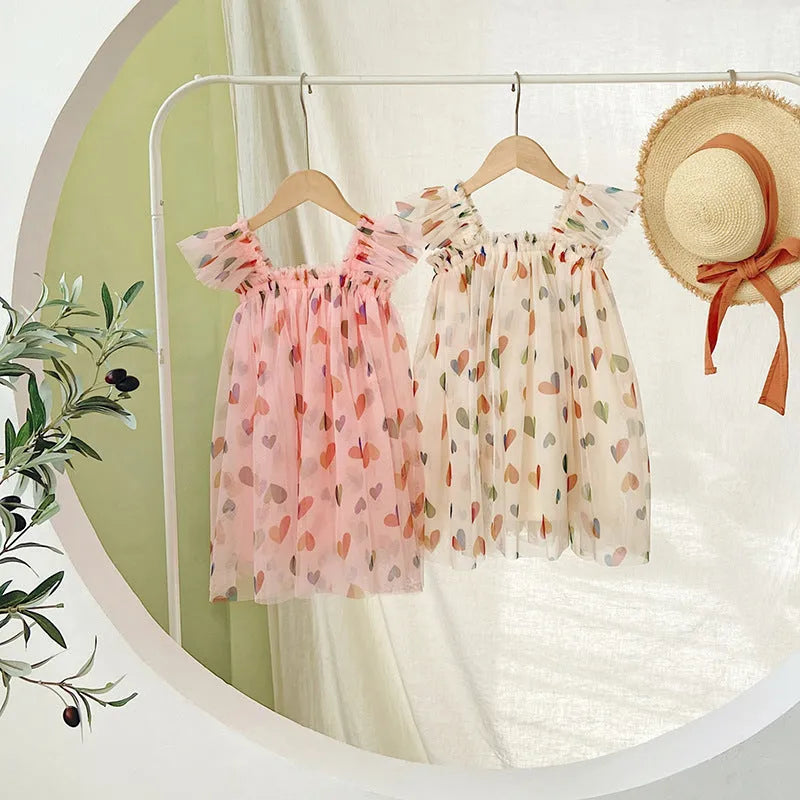 Summer cute heart printing mesh girl dress with cotton lining, apricot love colour, front view on child