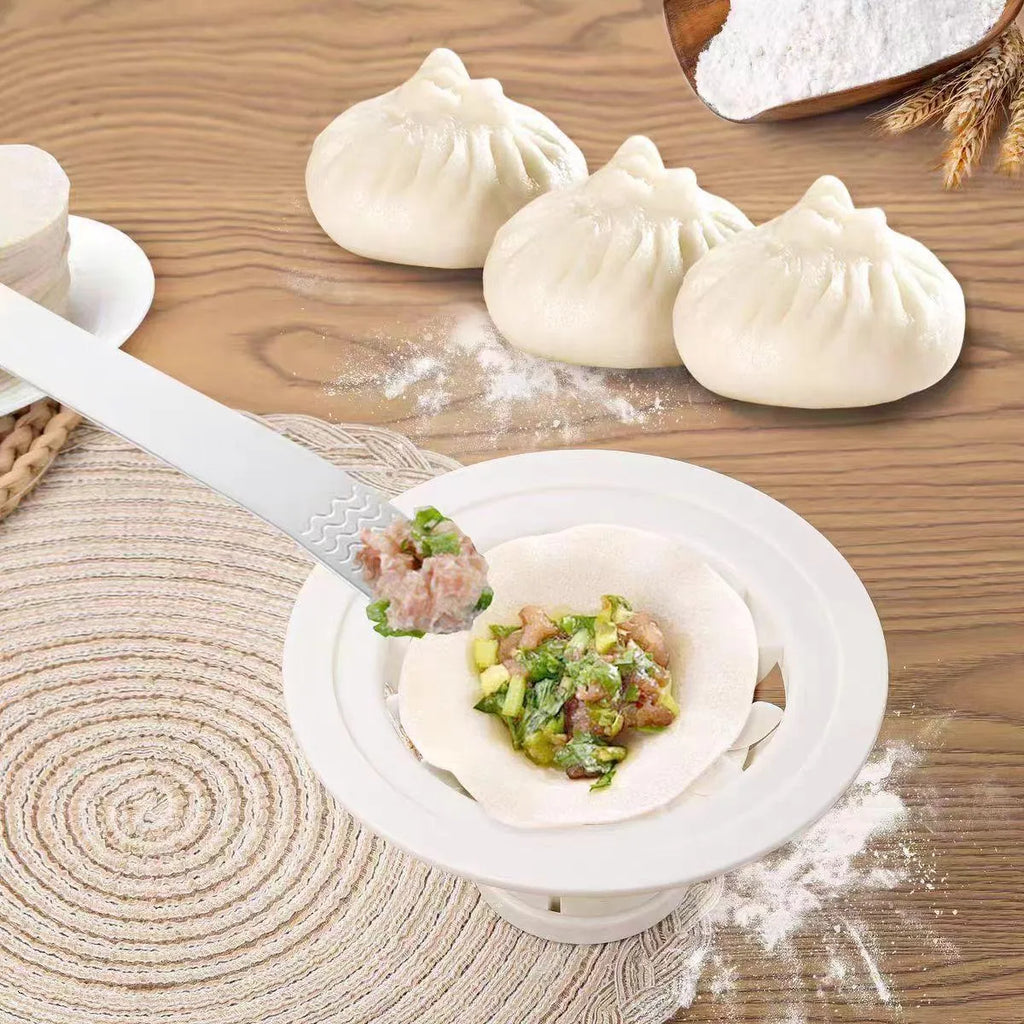 Black Jinkali four-piece set of steamed bun and dumpling moulds on a kitchen surface