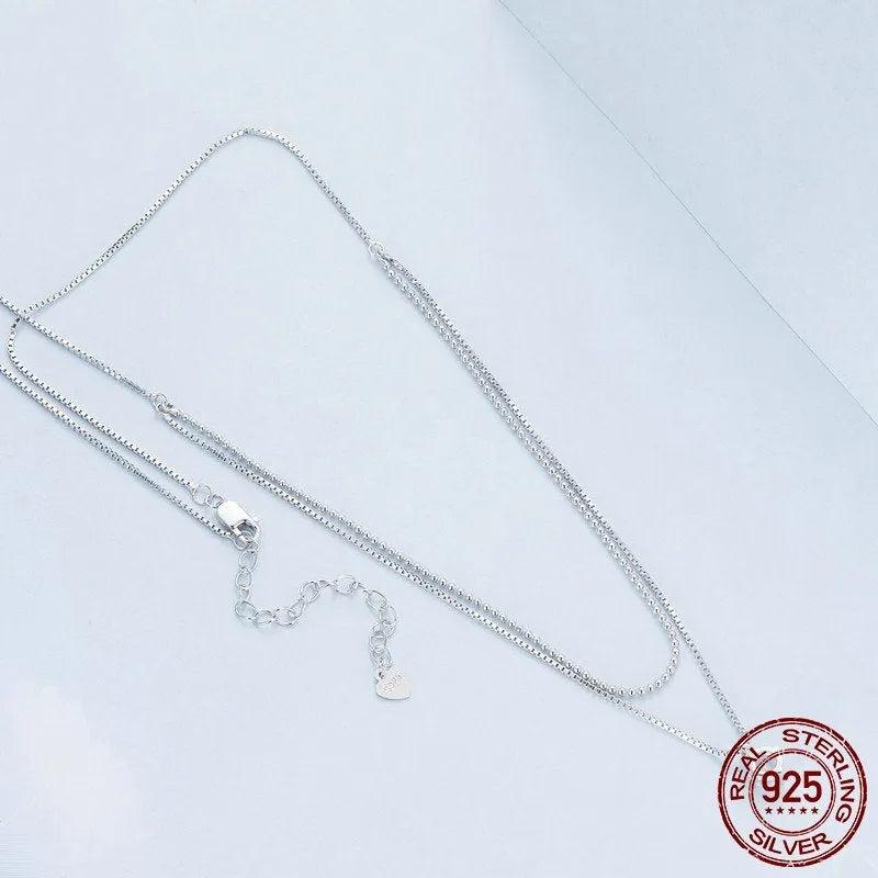 Women's double-layer sterling silver necklace with pearl chain and personality pendant