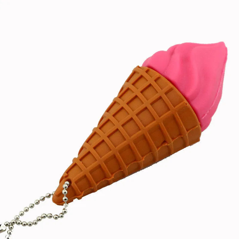 Pink ice cream shaped USB flash drive on a white background.
