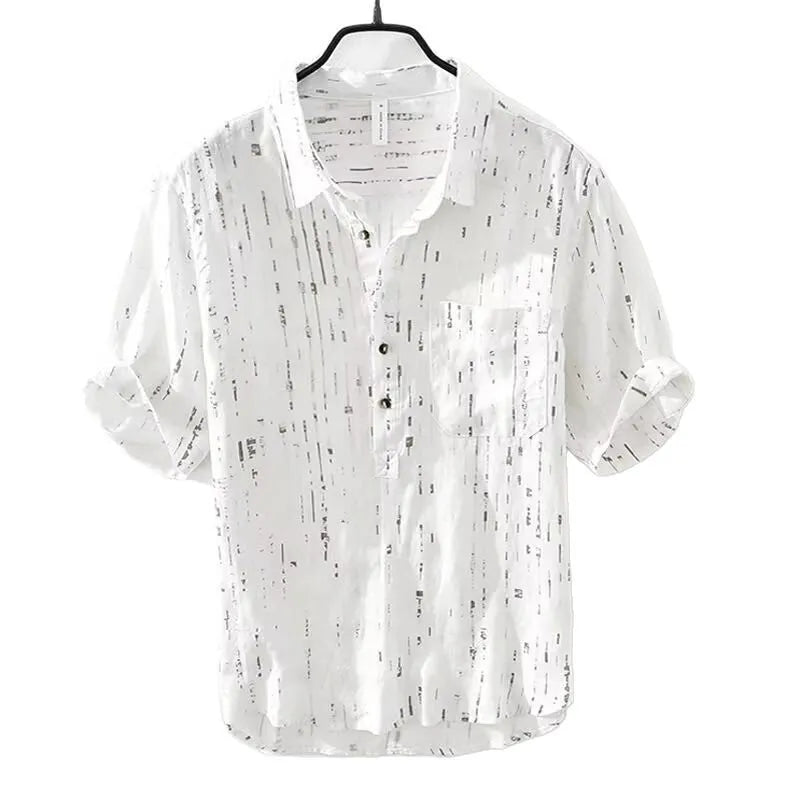 Man wearing a loose-fit black lapel polo shirt, a short-sleeved cardigan-style t-shirt for summer.