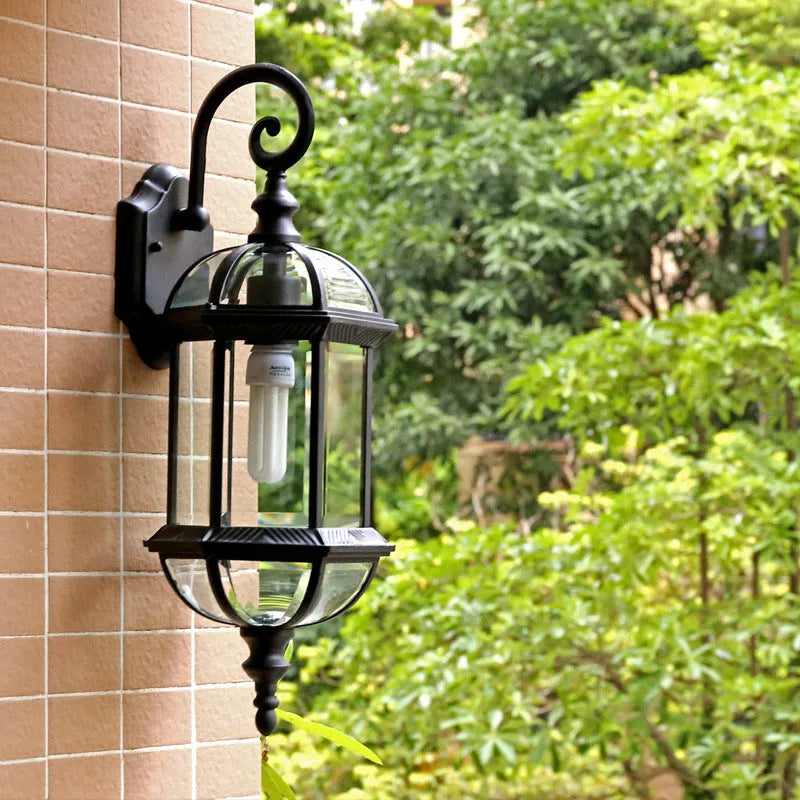 Gold and black outdoor aluminium waterproof wall lamp for courtyard decoration.