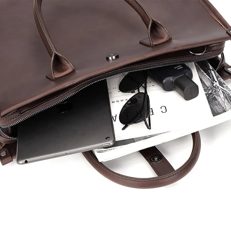 Brown PU leather men's shoulder messenger bag, medium size, with zipper closure and shoulder strap