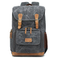Canvas DSLR camera backpack in khaki colour, showing backpack straps and main compartment.