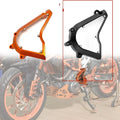 KTM Duke motorcycle chain front gear cover in black and orange options, 20cm by 15cm by 5cm.