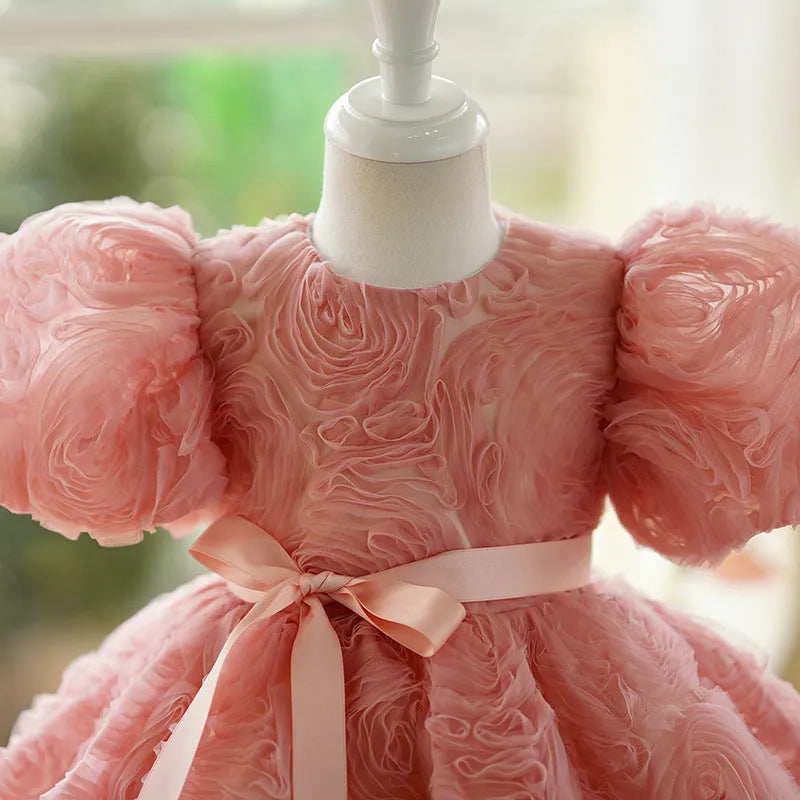 Children's girls birthday pettiskirt in bean pink with layered polyester design, front view