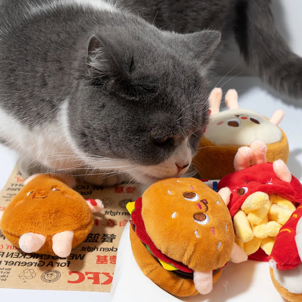 Set of five food-shaped cat chewing toys showing hamburger, chicken legs, fries, bread and hot dog designs