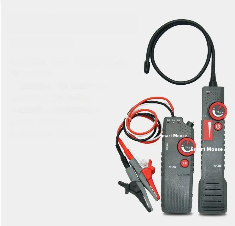 Line finder buried wire cable tester with transmitter and receiver on a workbench