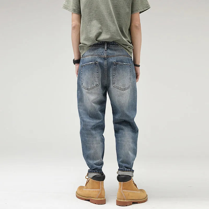 Men's retro straight-leg jeans in blue 100% cotton denim with mid-rise waist and zipper fly