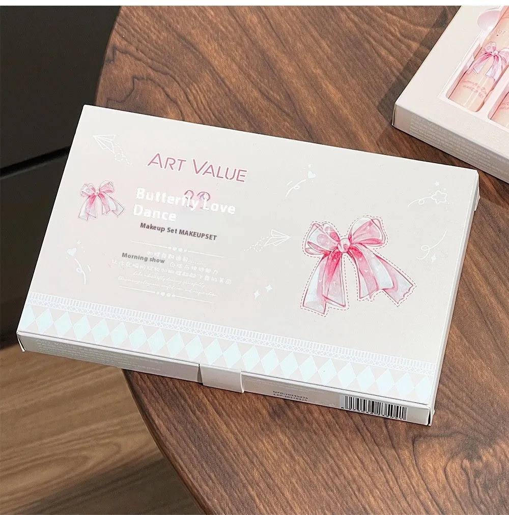 Butterfly Box makeup set showing four matte lip mud tubes, powder blusher compact, and necklace accessory