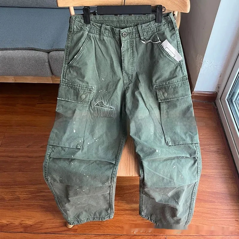 Men's army green washed cotton paratrooper trousers with large pockets, mid waist and zipper fly, sizes S to XXL