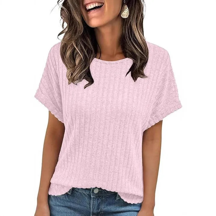 Women's loose fit short-sleeved t-shirt with round neck and sunken stripe detail, solid colour, front view