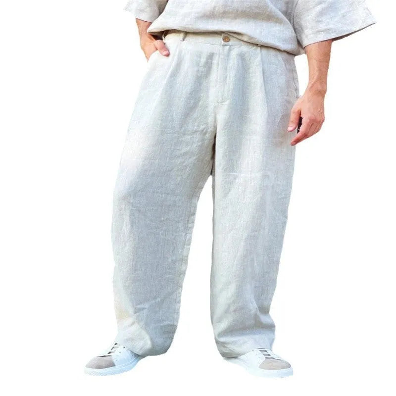 Men's loose fit linen pleated high waist jogger trousers in cotton fabric with elasticated waistband