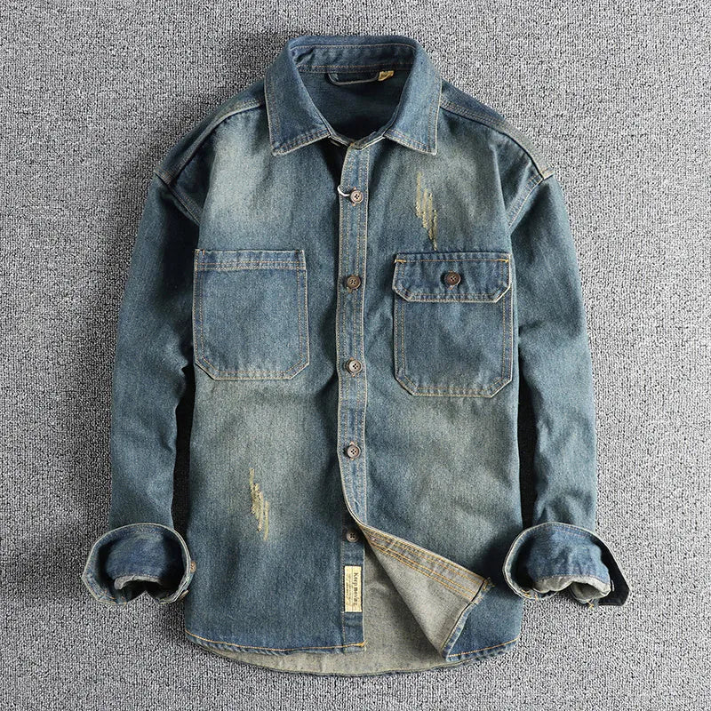 Men's light blue vintage denim shirt with loose fit and long sleeves
