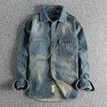 Men's light blue vintage denim shirt with loose fit and long sleeves