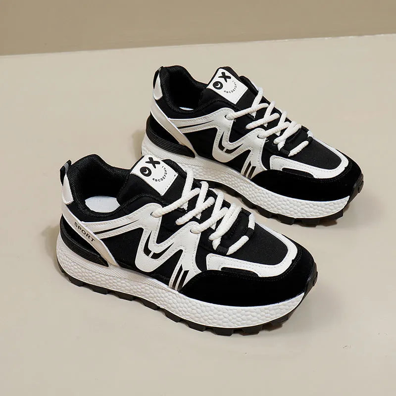 Women's solid colour platform casual shoes with lace-up front and round toe in black, grey, or khaki.