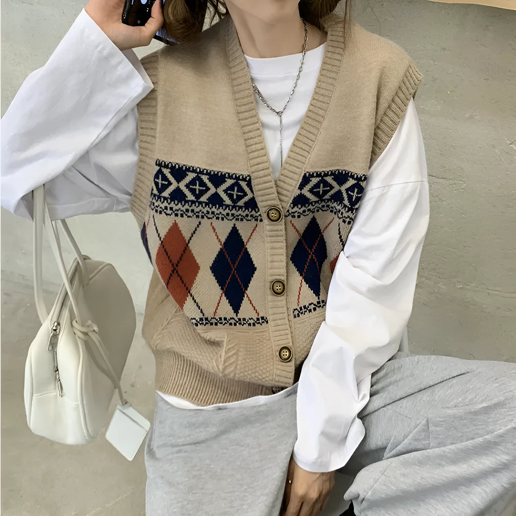 Khaki diamond plaid sleeveless loose cardigan top on a hanger