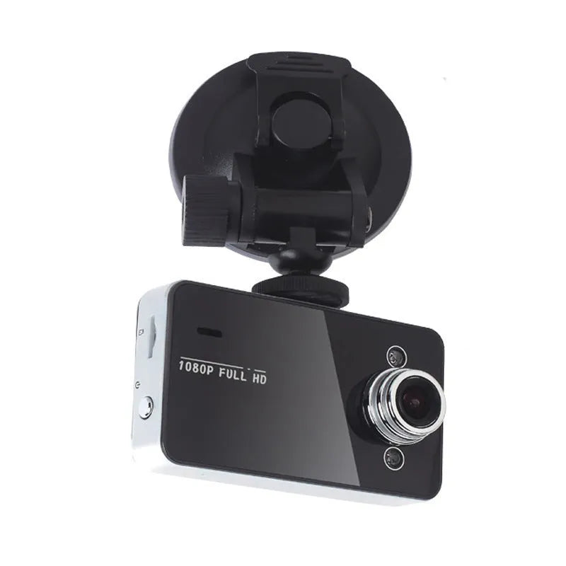 K6000 black driving recorder, 90x54x16mm, with 140° front lens and 720P recording, shown with mounting bracket.